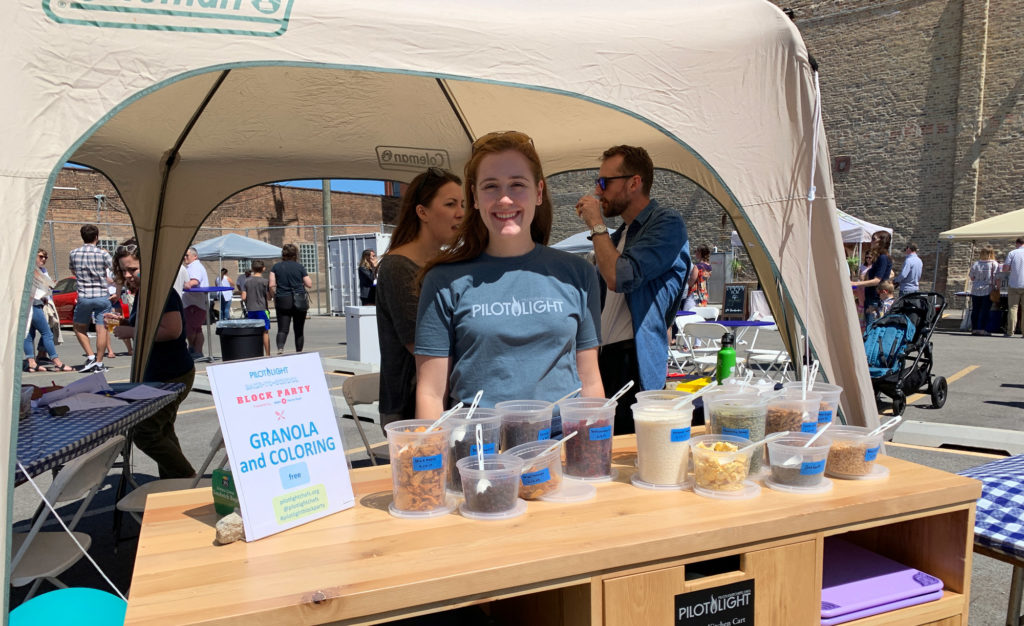 Pilot Light’s Emma Sommine hosting a Granola station for youth to build their own Granola